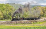 EBT 16 and excursion train southbound on the high fill